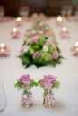 Pink themed festive wedding table setting and decoration