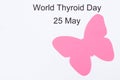 Pink thyroid shape and inscription World Thyroid Day 25 May. Problems with thyroid. Copy space for text