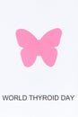 Pink thyroid shape and inscription World Thyroid Day. Problems with thyroid