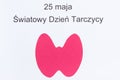 Pink thyroid shape and polish inscription 25 May World Thyroid Day. Problems with thyroid