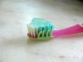 Pink toothbrush and paste Royalty Free Stock Photo