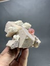 Pink tourmaine with microcline feldspar and qartz specimen from skardu Pakistan Royalty Free Stock Photo