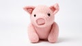 Pink Knitted Pig Toy On White Background