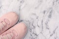 Pink trainers on white marble background Royalty Free Stock Photo