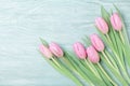 Pink tulip flowers on rustic table for March 8, International Womans or Mothers day. Beautiful spring card. Top view. Royalty Free Stock Photo