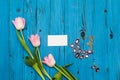 Pink tulips on a blue wooden board Royalty Free Stock Photo