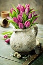 Pink tulips bouquet, easter eggs and garden tools Royalty Free Stock Photo