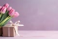 pink tulips and box on wooden background pink tulips in a gift box pink tulips and box Royalty Free Stock Photo