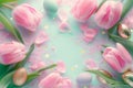 Pink tulips and Easter eggs form cheerful springtime background