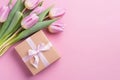 pink tulips and gift box on wooden background bouquet of tulips and box pink tulips and gift box Royalty Free Stock Photo