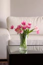 Pink tulips in modern living room