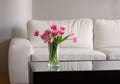 Pink tulips in modern living room