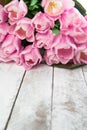 Pink tulips over shabby white wooden table Royalty Free Stock Photo