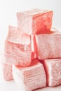 Pink Turkish delight on the white background close-up Royalty Free Stock Photo