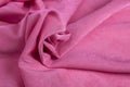 Pink twisted fabric close-up