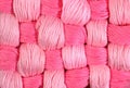 Pink twisted skeins of floss as background texture