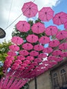 Pink umbrella art in Saumur, Maine et Loire, France