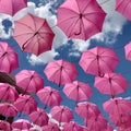 pink umbrellas in the sky