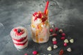 Pink unicorn milkshake with whipped cream and dessert, dripping sauce and candy Royalty Free Stock Photo