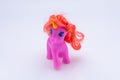 Pink unicorn toy isolated in front a white background Royalty Free Stock Photo