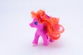 Pink unicorn toy isolated in front a white background Royalty Free Stock Photo