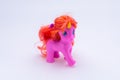 Pink unicorn toy isolated in front a white background Royalty Free Stock Photo