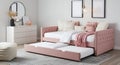 Pink Upholstered Daybed with Trundle and Decorative Pillows Royalty Free Stock Photo