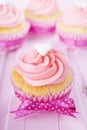 Pink Valentine cupcakes on a rustic pink table Royalty Free Stock Photo
