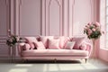 Pink velvet couch in the room with grey walls and flowers Royalty Free Stock Photo