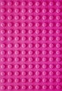 Pink vertical plastic texture background