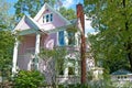 Pink Victorian House In Green Trees Royalty Free Stock Photo