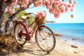 pink vintage bicycle with baskets with flowers stands on the beach outdoors. romantic greeting card