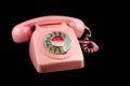 Pink Vintage Telephone on a Black Background Royalty Free Stock Photo