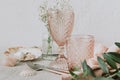 Pink Vintage Wedding Table Setting -crystal wine glasses with flowers Royalty Free Stock Photo