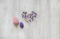 Pink and violet beauty blenders, sponges on wooden grey background. Cosmetic tools for makeup and hydrogel balls in the form of he Royalty Free Stock Photo