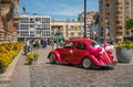 Pink VW beetle car as vehicle for married couple, Dunkerque, France Royalty Free Stock Photo