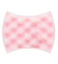 Pink washcloth for body on a white background. Bath accessories. Royalty Free Stock Photo