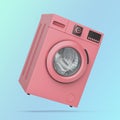 Pink washing machine on blue background Royalty Free Stock Photo