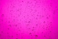 Pink water drops on the mirror Royalty Free Stock Photo
