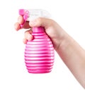 Pink water pulverizer spray in female hand cloe up isolated on white background. Royalty Free Stock Photo