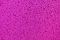 Pink waterproof material, rip stop cloth with drops of water Royalty Free Stock Photo