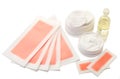 Pink waxing strips, cream and body oil Royalty Free Stock Photo