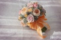 Pink wedding bouquet with orange bow Royalty Free Stock Photo