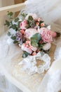 Wedding bouquet of peonies lying on the chair Royalty Free Stock Photo