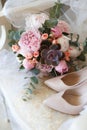 Wedding bouquet of peonies lying on the chair Royalty Free Stock Photo