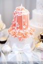 Pink wedding cake decorated with sugar flowers Royalty Free Stock Photo