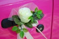 Pink wedding car door with flower decoration Royalty Free Stock Photo