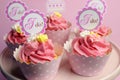 Pink wedding cupcakes with I Do topper signs - horizontal.