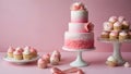 pink and white cake and cupcakes on a table