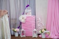 Pink and white decorations with flowers, lanterns and bird cage for birthday or wedding party Royalty Free Stock Photo